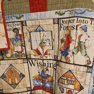 Whimsical Storybook Quilt with Red and Blue Accents